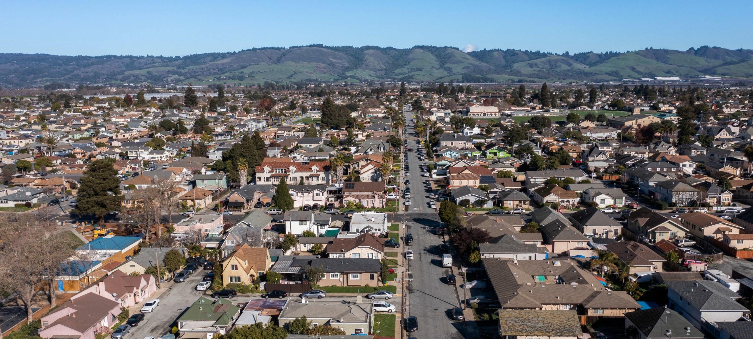 Aerial view of Watsonville, CA downtown and mountains