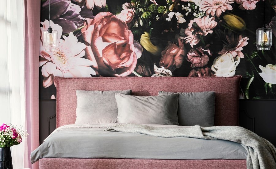 Pink modern bedroom with dark floral wallpaper accent wall