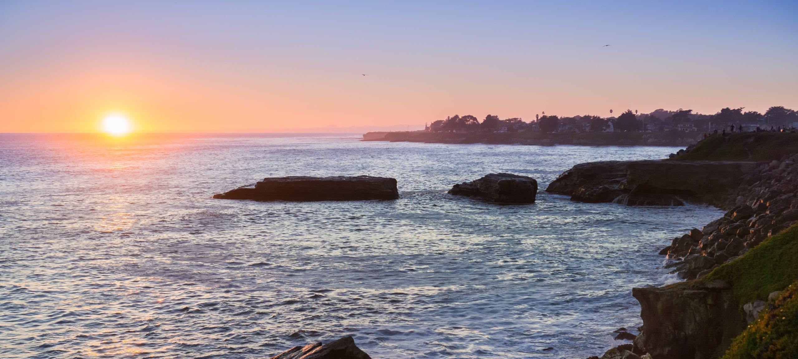Sunset at Santa Cruz coast with rocks