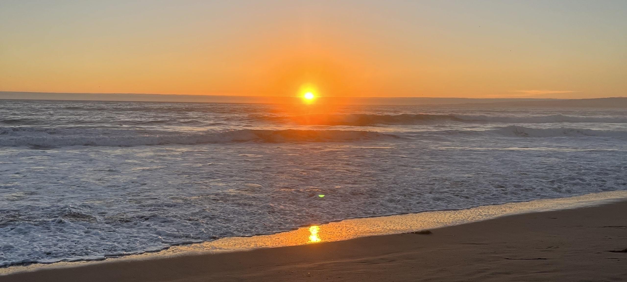 Orange sunset at Manresa State Beach in Santa Cruz, CA