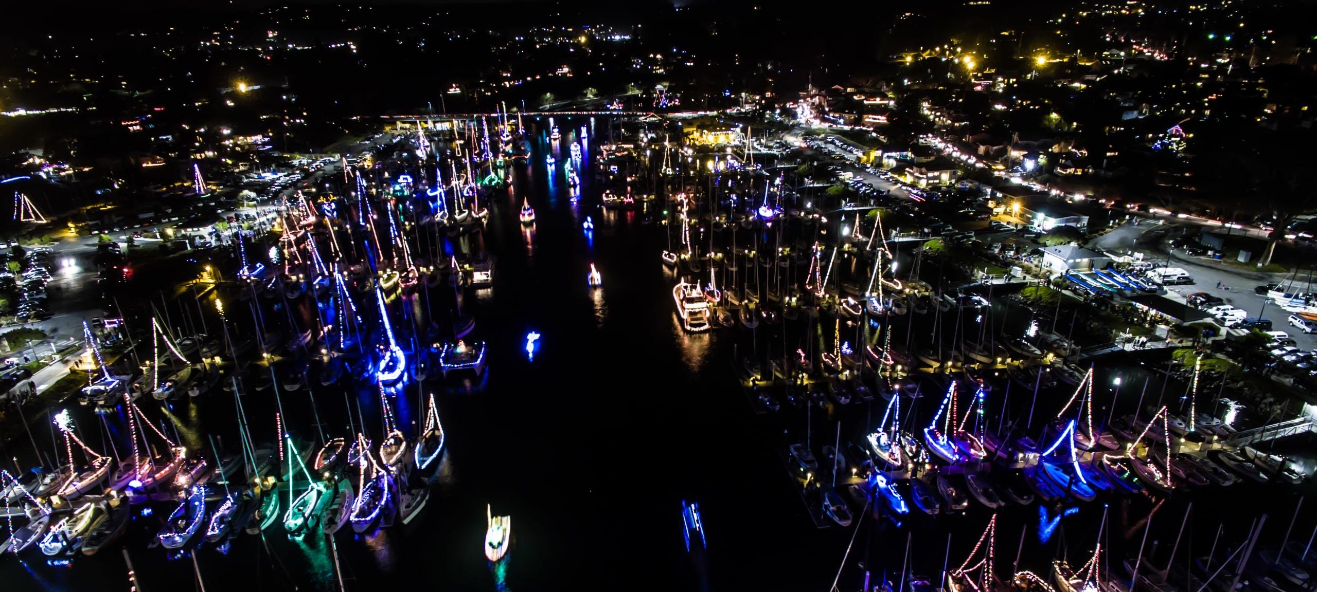 Holiday boats with lights at night in Santa Cruz marina
