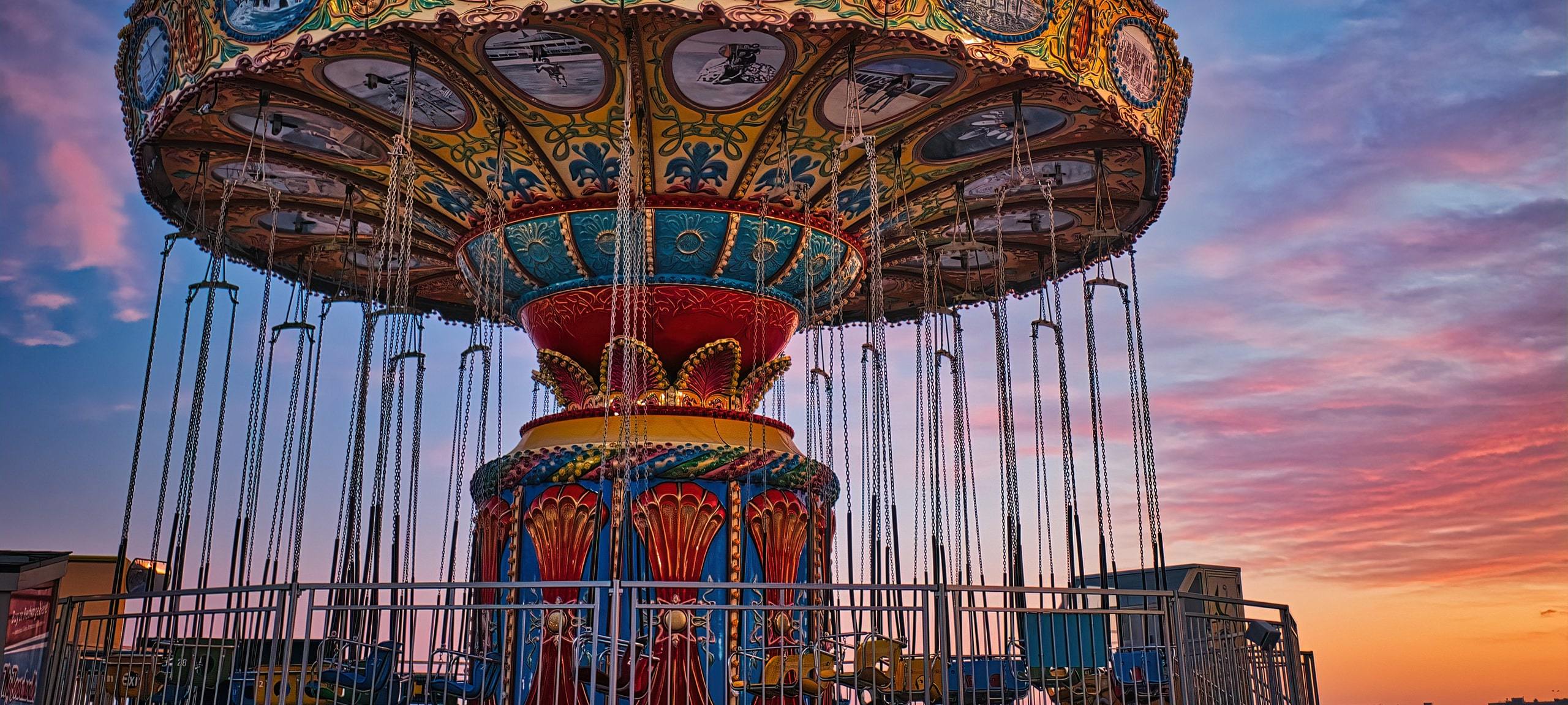 Carousel at historic Santa Cruz Boardwalk during sunset