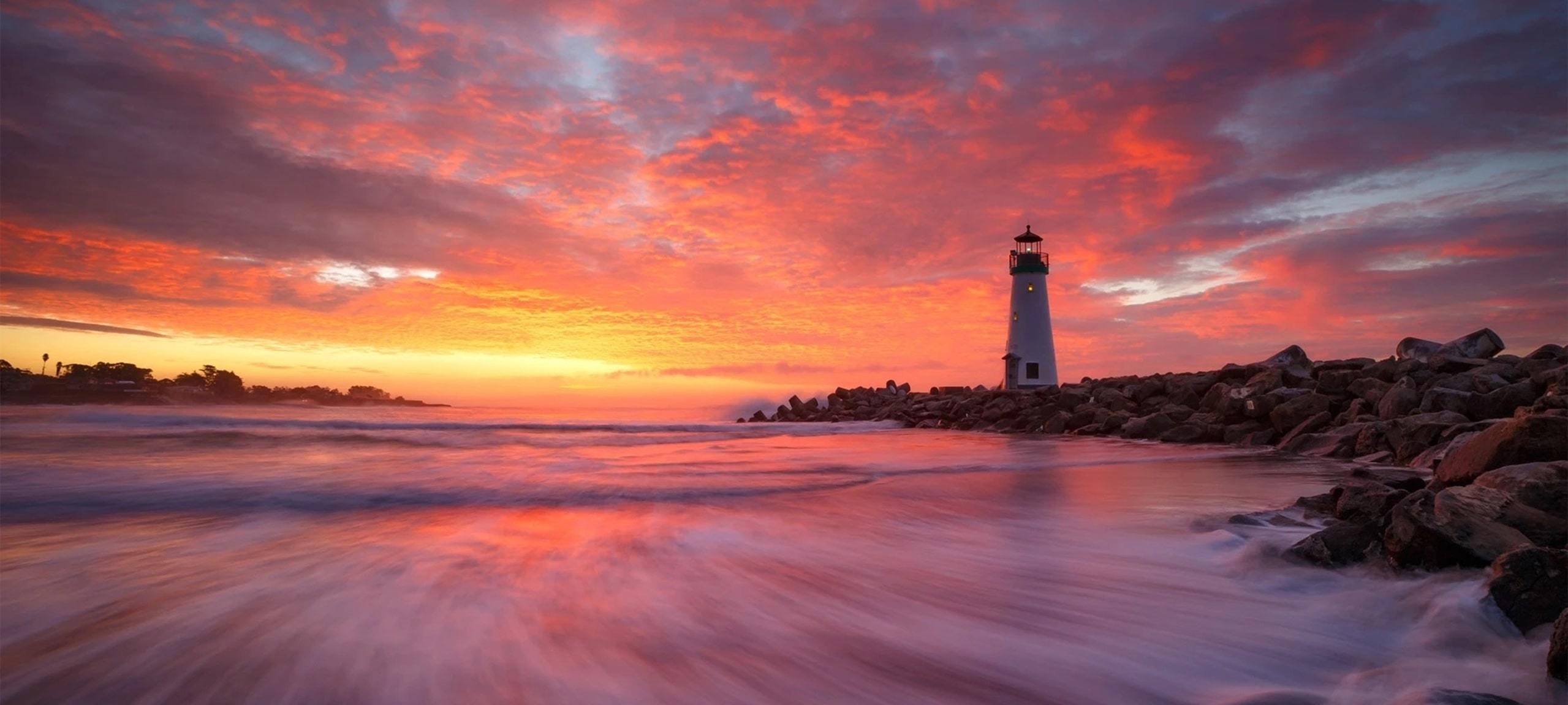 Pink and orange sunset at Walton Lighthouse in Santa Cruz, CA